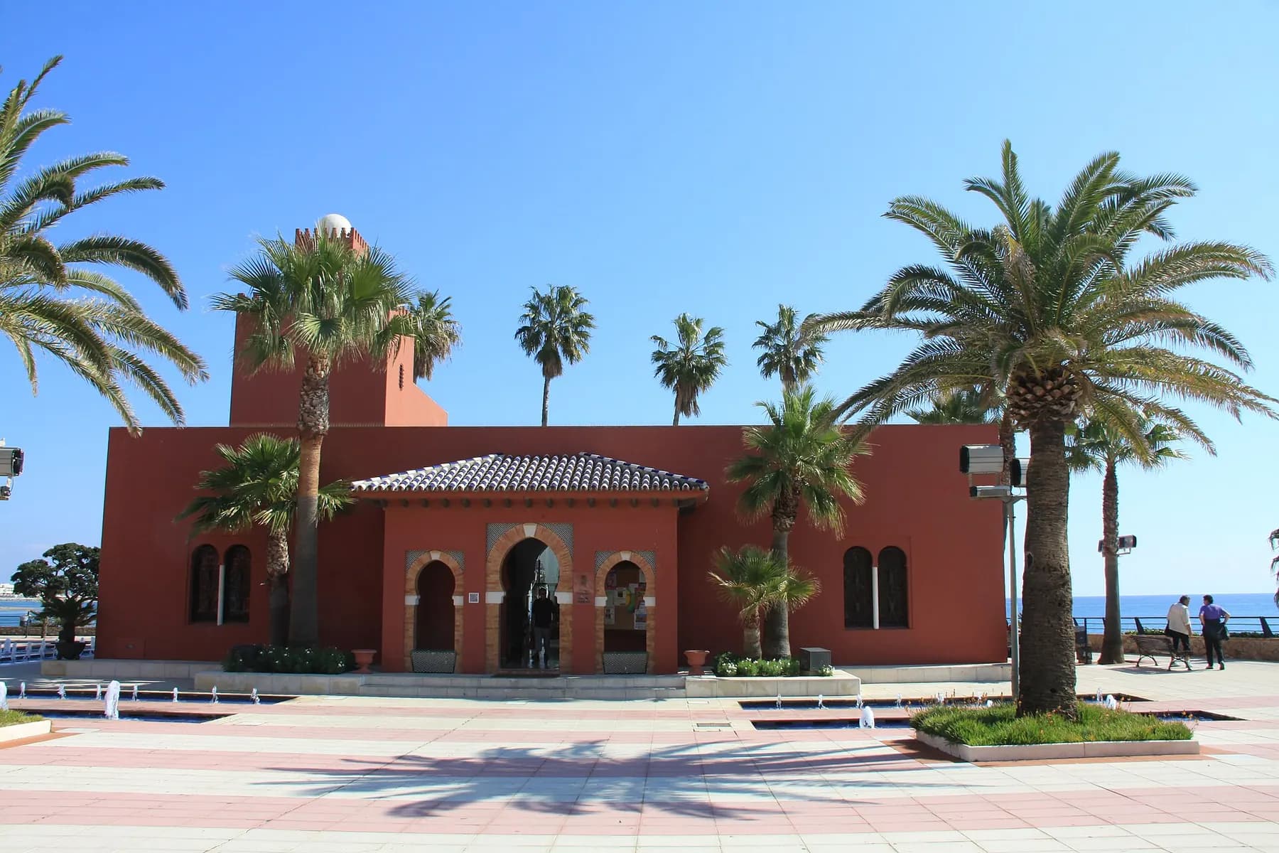 Castillo de Bil-Bil among palm trees on the Benalmádena seafront