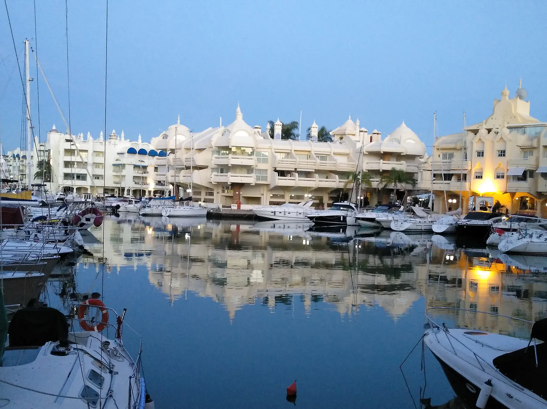 Boats and waterfront buildings of Puerto Marina, Benalmádena, at dusk